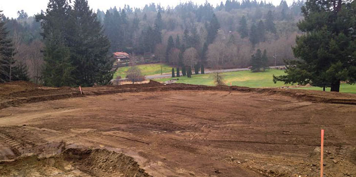 Kip Kalbrener and Mark Miller remodeling seventh green at Gig Harbor